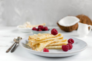 Raspberry crepes on a plate